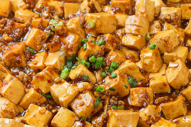 The image shows a plate of Vegan General Tso's "Chicken," a popular plant-based version of the classic Chinese-American dish.